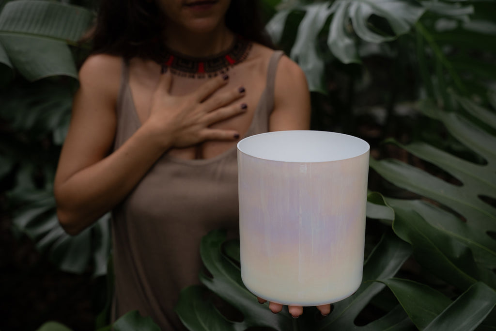 Guided crystal bowl consultation for sound healing practice.