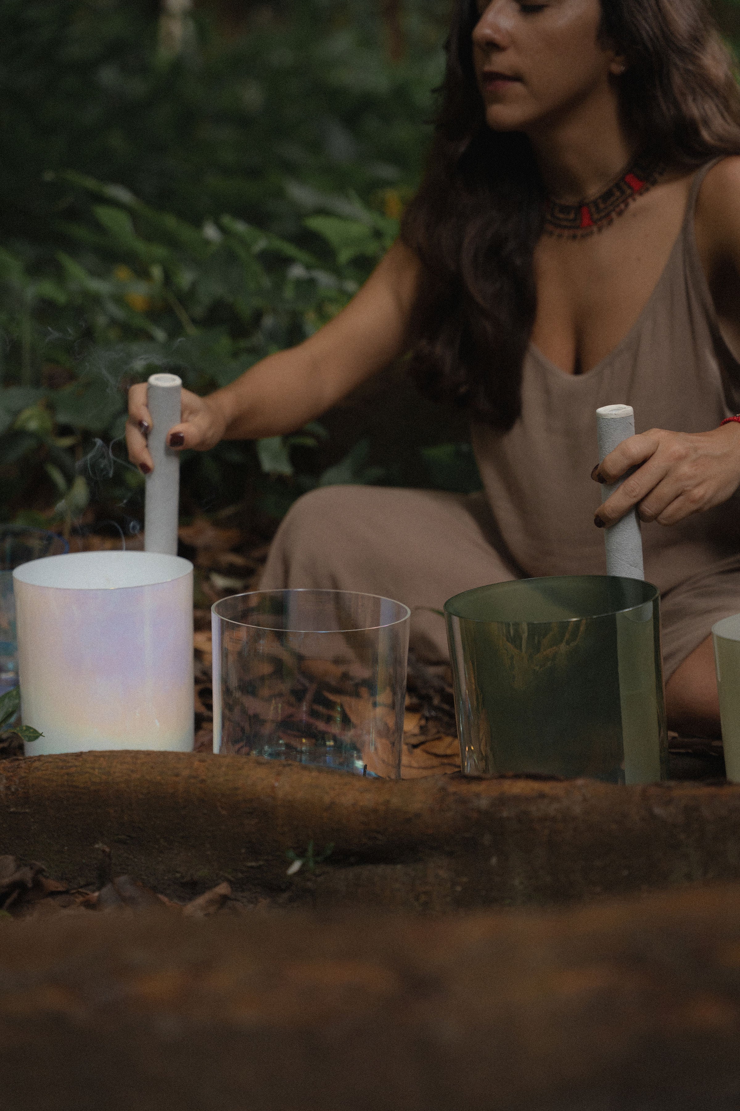 Sound healing training with crystal singing bowls in nature.